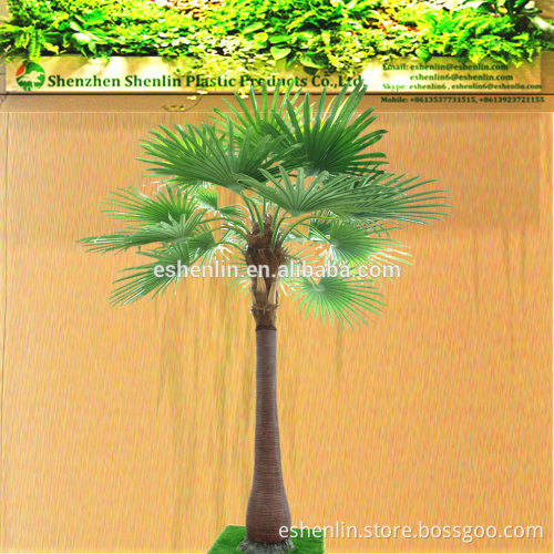 Landscaping Artificial fake washingtonia robusta trees with plastic leaves and fiberglass trunk
